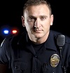 image of officer with badge on left chest